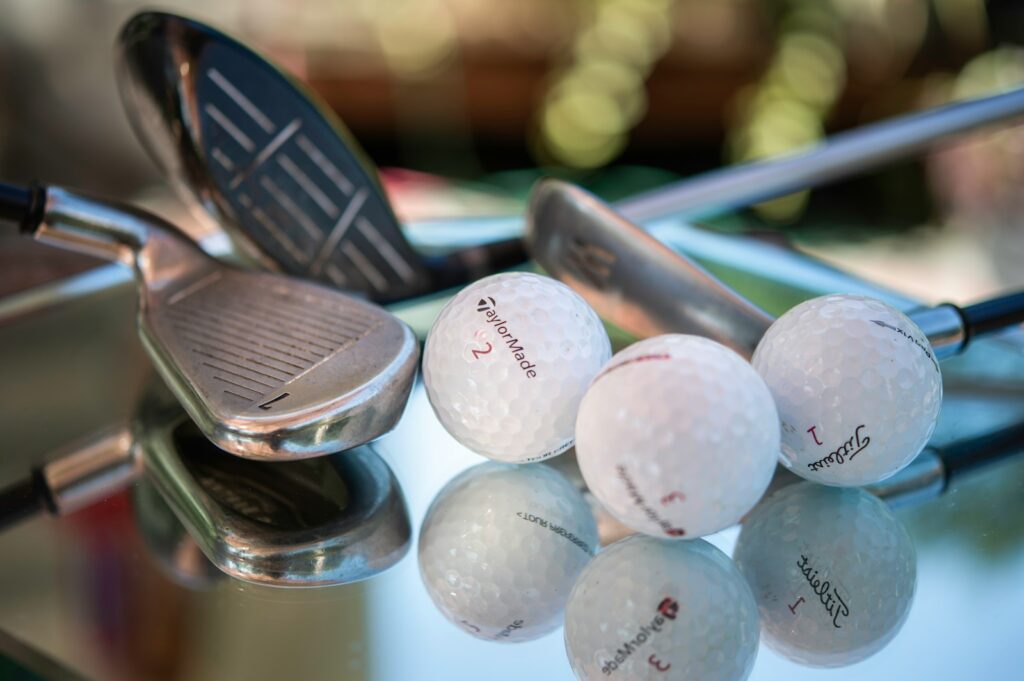 golf ball on green plastic container